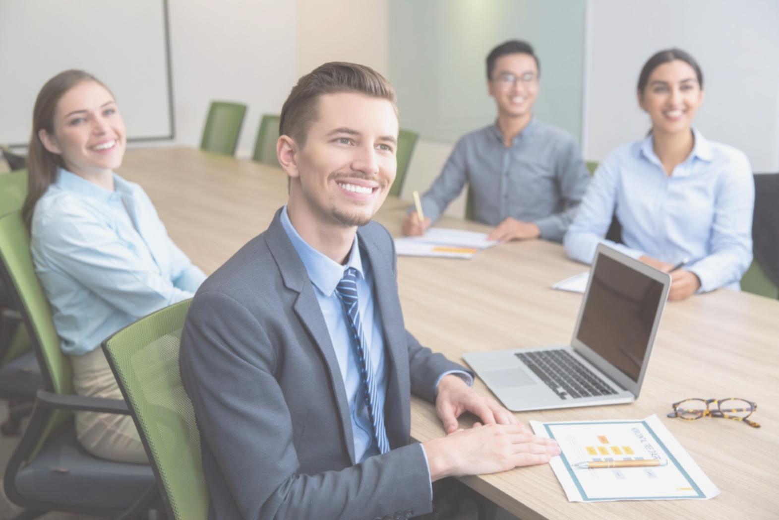 Financial analysis workspace with charts and calculations spread across a desk